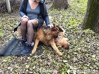 Chubby woman filmed putting the dog's dick in each of her holes